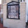 Exterior sign on corner of 4th & Ovington Avenues, presented by the Bethlehem Brotherhood; restored in 2013